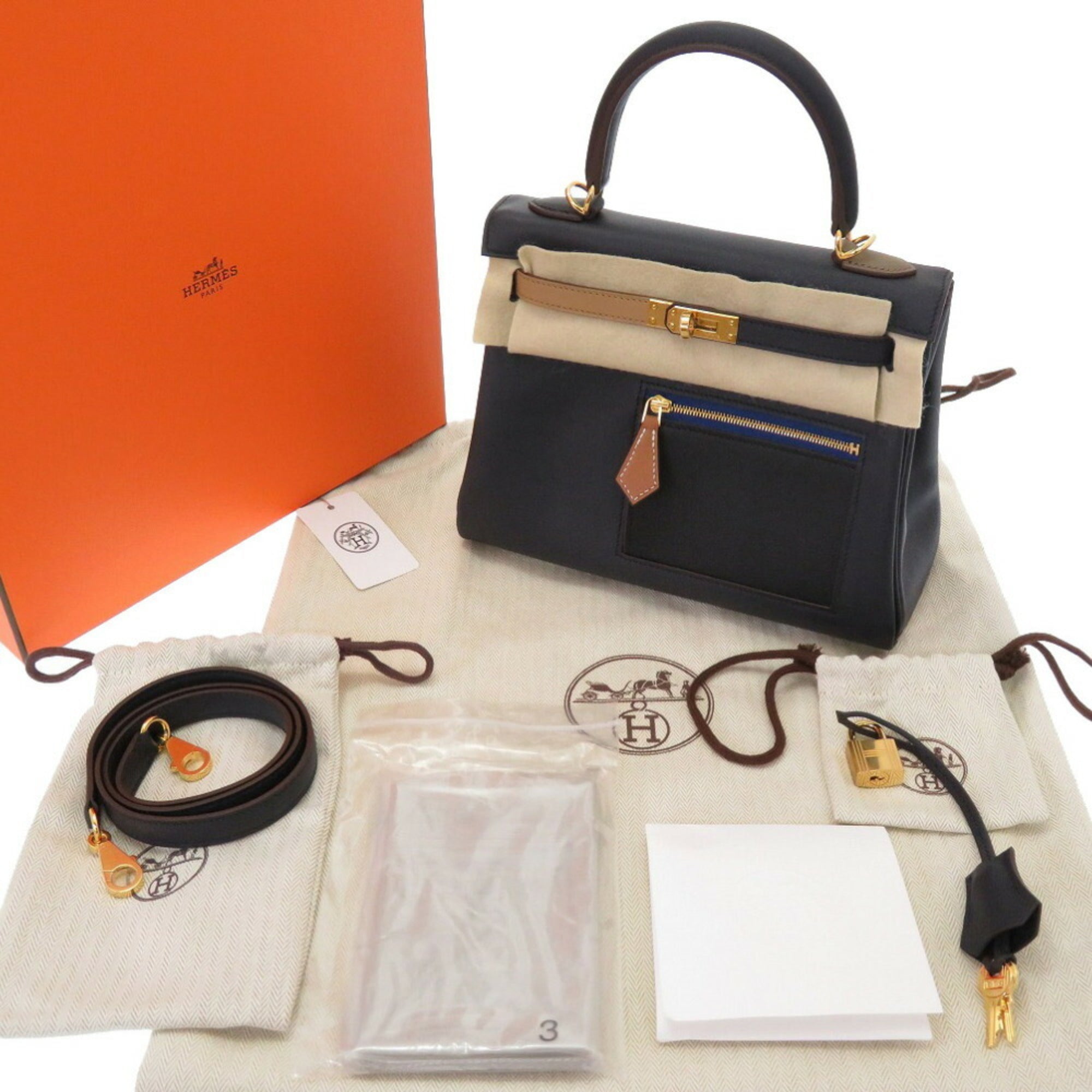 Hermes Kelly 25 Colormatic Swift Blue/Black/Chai/Etoupe/Gold U Engraved () Handbag